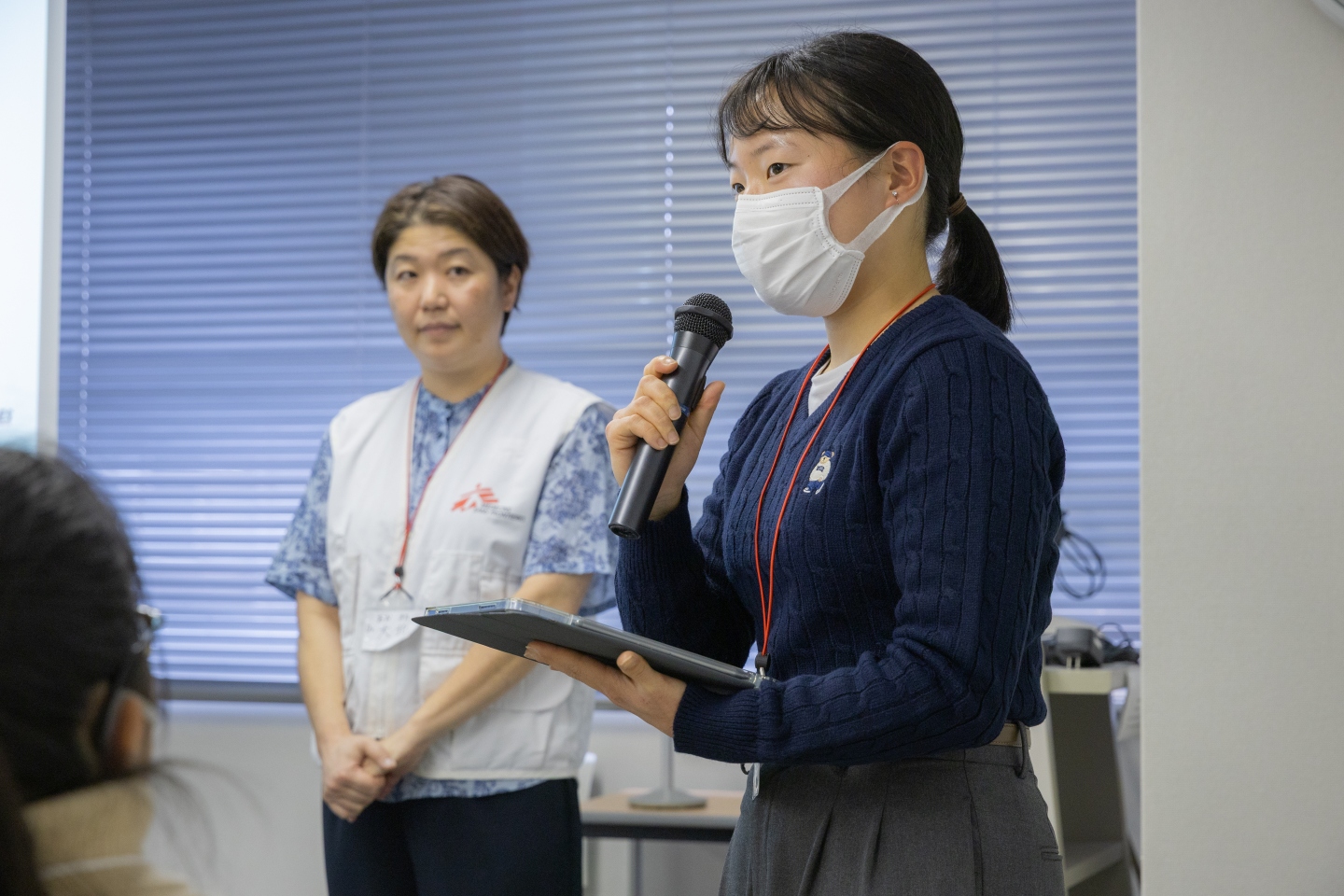 司会から開催のあいさつ　© Yuichi Mori Photography
