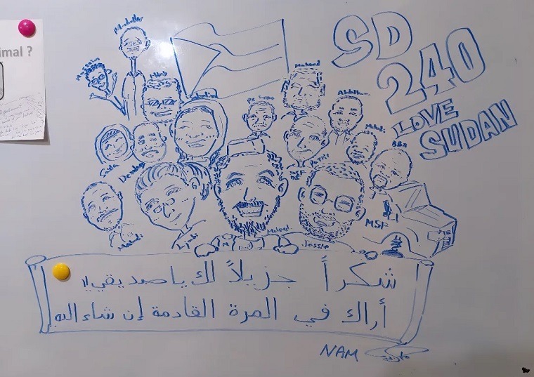 スーダンでの活動の最終日、ホワイトボードにメンバーの似顔絵をプレゼント。YouTubeで描き方を学んだ　© MSF